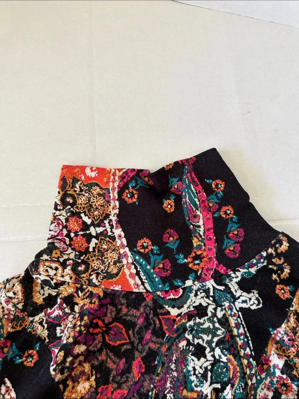FREE PEOPLE “ALL DOLLED UP “ MINI DRESS WITH A TURTLENECK AND KEYHOLE BACK SZ S